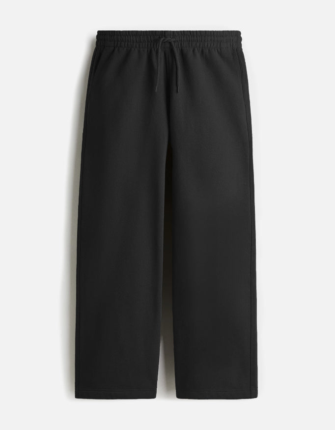 Black pants on a light gray background