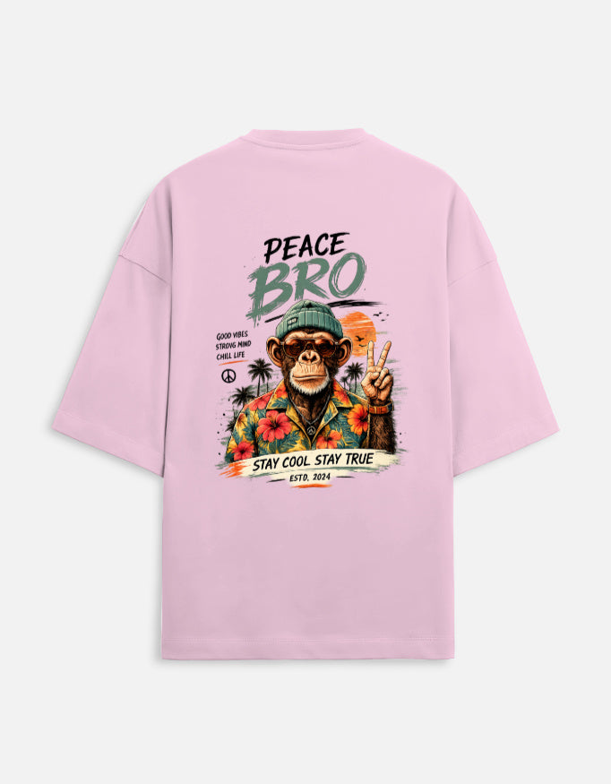 Pink t-shirt with a graphic of a monkey and text on a white background